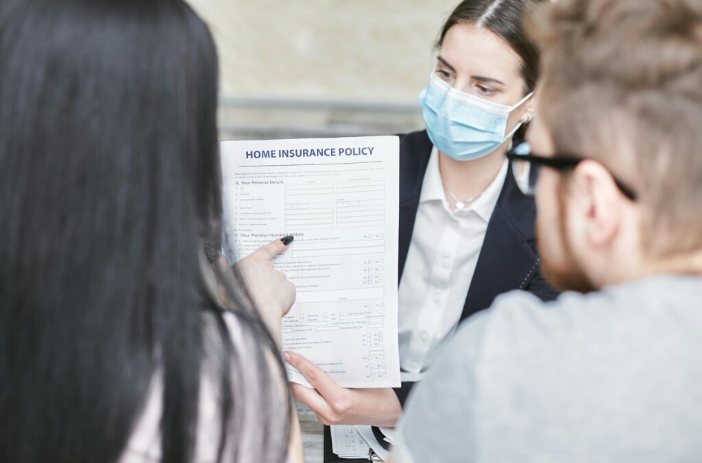 A photo of a happy customer reviewing their car insurance policy. — best car insurance in Nevada