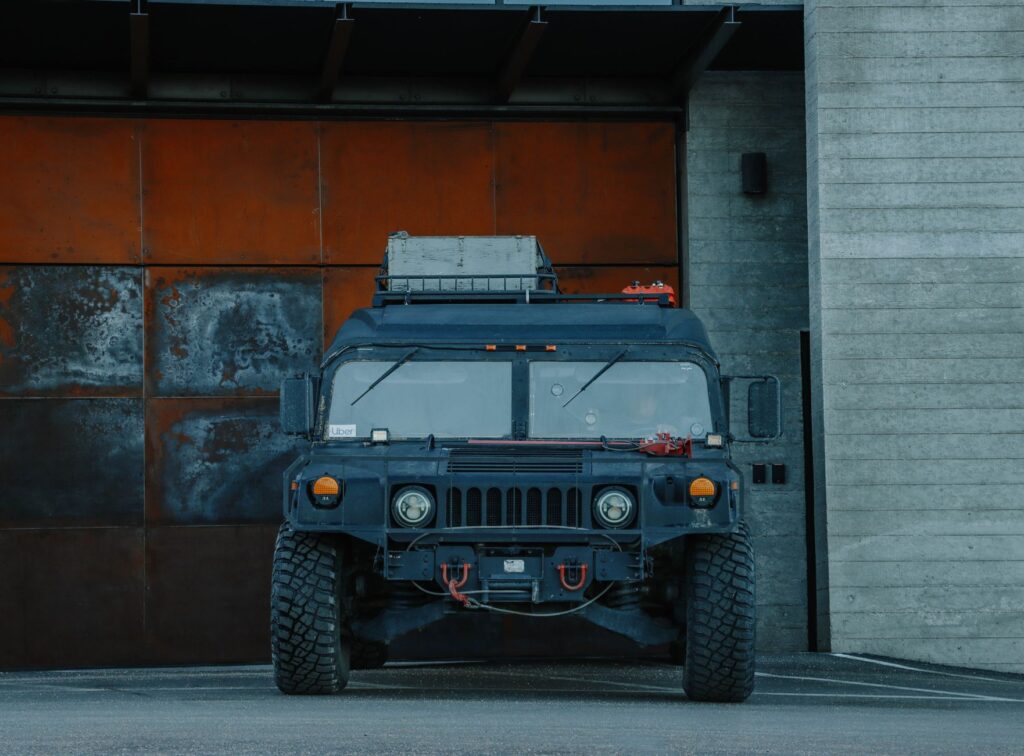 A family in front of a car, symbolizing military auto coverage. — military car insurance nevada