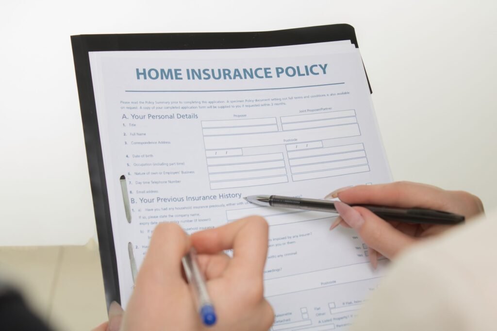 A close-up image of an insurance claim form being filled out. — car accident insurance Nevada