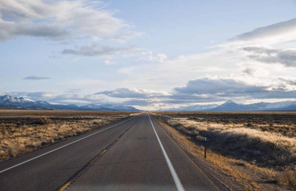 A photo of a Nevada highway with a caption discussing uninsured drivers in the state — uninsured motorist coverage Nevada