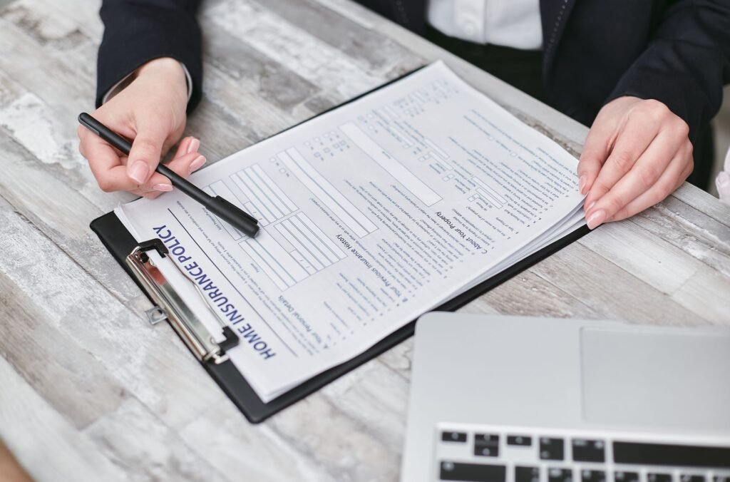 An image of a person reviewing their car insurance policy to identify savings. — save money car insurance Nevada