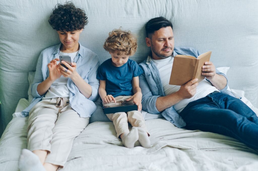 An image of a family comfortably managing their bundled insurance policies on a digital device. — bundling insurance Nevada