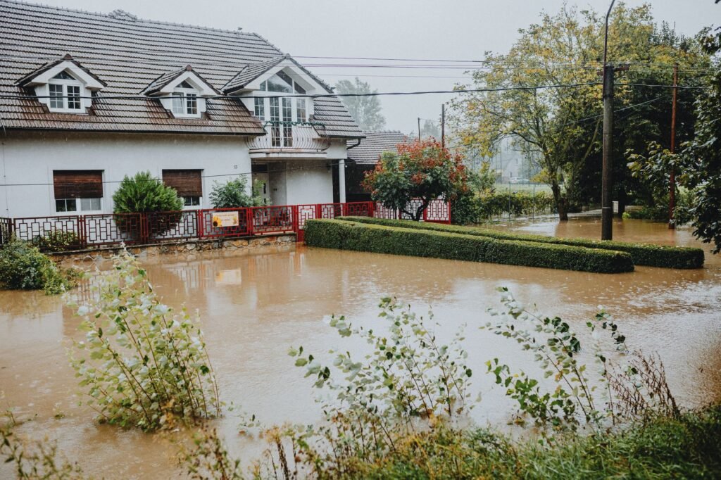 Photo of a flooded street in Nevada during a heavy rainstorm — Nevada weather car insurance rates