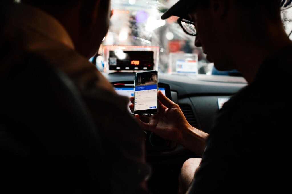A photo of a rideshare driver with a passenger in a Nevada city, showcasing the importance of Nevada rideshare insurance